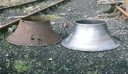 A new petticoat pipe, or Chimney Bell, was required and the Society organised the tooling for a batch of new ones to be produced. The old and new are seen side by side at Bewdley on 4th April 1999. Photo Simon Marshall.